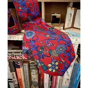 Vintage silk necktie by Henry Christian in red with flower and tassel prints